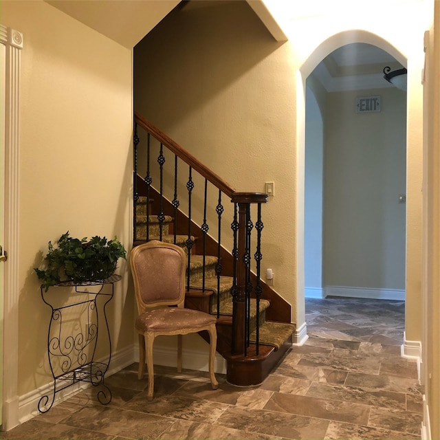 stairway with dark tile flooring