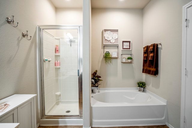 bathroom with independent shower and bath