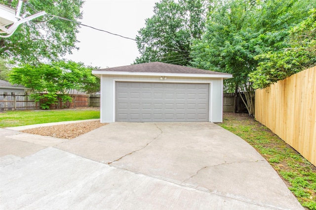 detached garage with fence