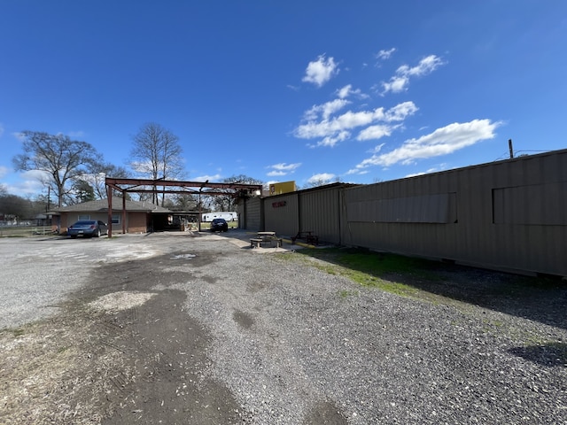 exterior space with a carport