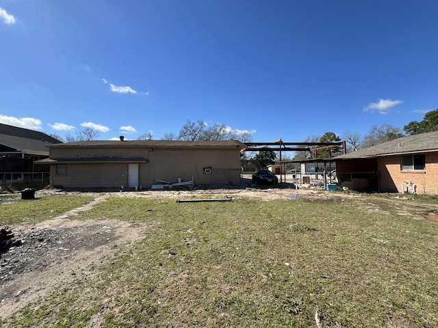 view of yard featuring a carport