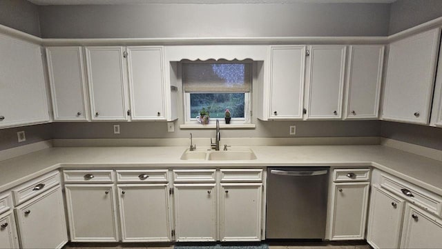 kitchen featuring white cabinetry, sink, and stainless steel dishwasher