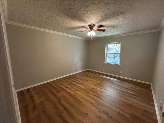 empty room featuring hardwood / wood-style flooring, ceiling fan, crown molding, and a textured ceiling