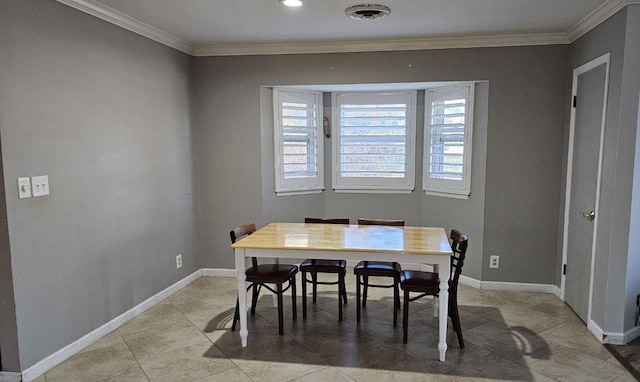 tiled dining area with crown molding