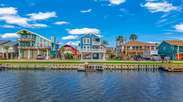 property view of water featuring a boat dock