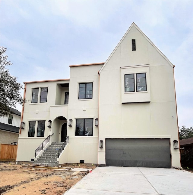 view of front of home with a garage