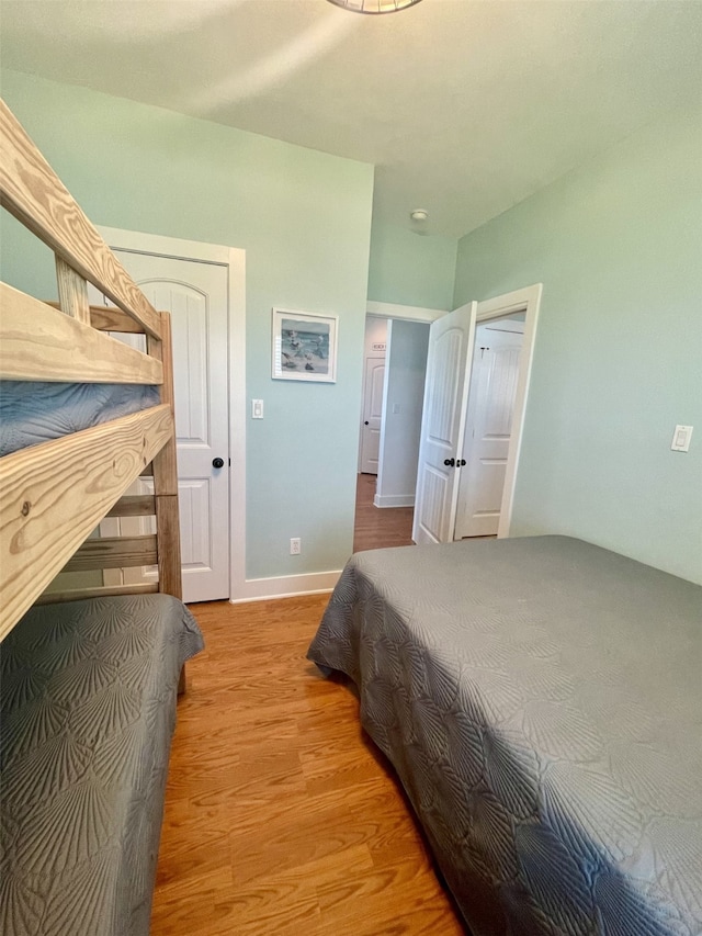 bedroom featuring wood-type flooring