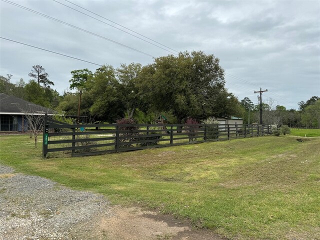 exterior space with a yard and a rural view