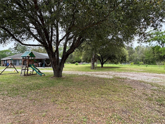 view of yard with a playground