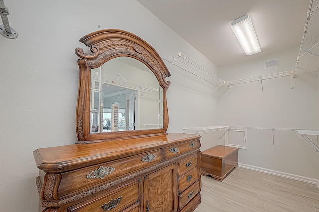 spacious closet with light wood-type flooring