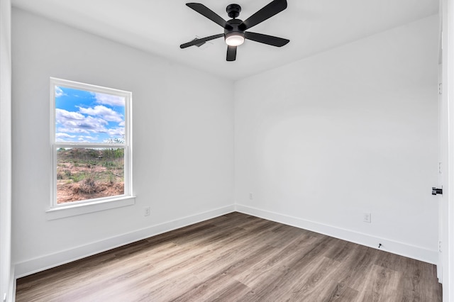 unfurnished room with light hardwood / wood-style floors and ceiling fan