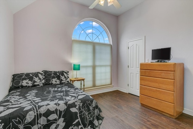 bedroom featuring ceiling fan and dark hardwood / wood-style flooring