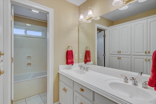 bathroom featuring double sink, tile flooring, vanity with extensive cabinet space, and shower / bath combination