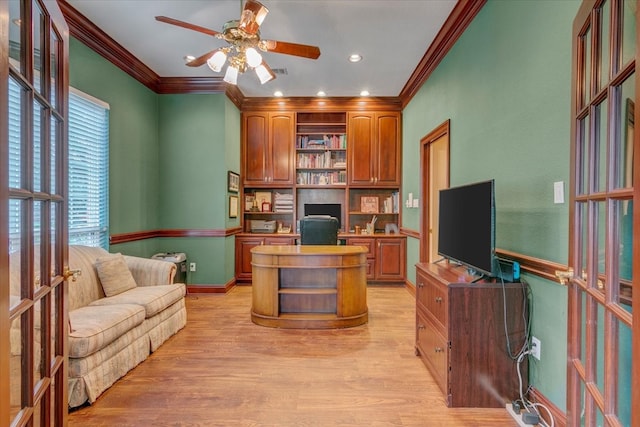 home office featuring french doors, light hardwood / wood-style floors, ornamental molding, and ceiling fan