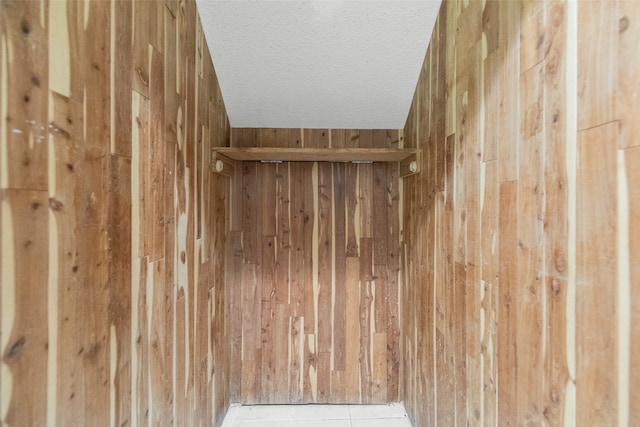 interior details featuring a textured ceiling