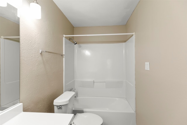 full bathroom with shower / bathtub combination, toilet, and vanity