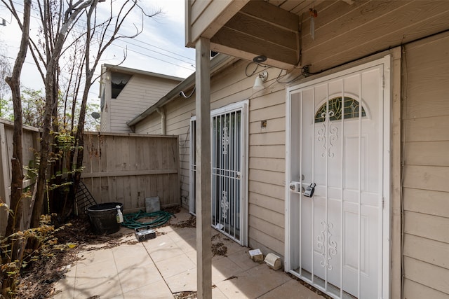 doorway to property with a patio