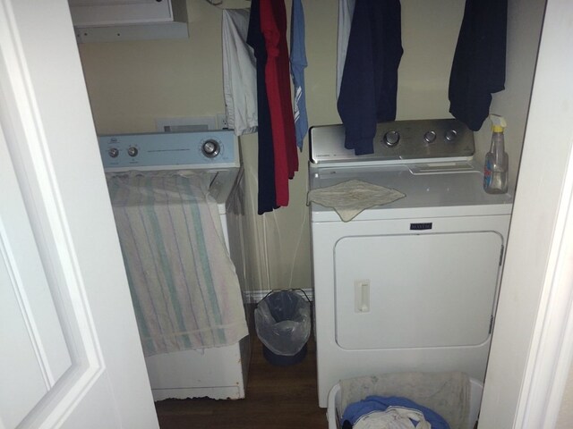 washroom featuring washer / dryer and dark hardwood / wood-style floors