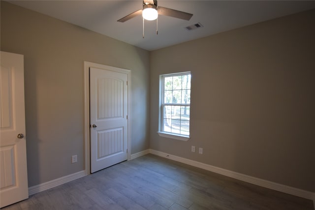 unfurnished bedroom featuring ceiling fan and light hardwood / wood-style flooring