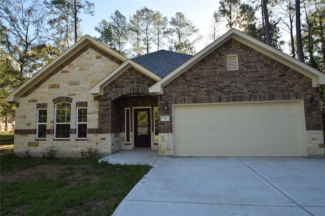 view of front of house with a garage