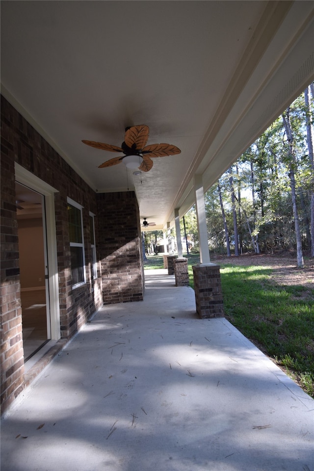 view of patio / terrace featuring ceiling fan