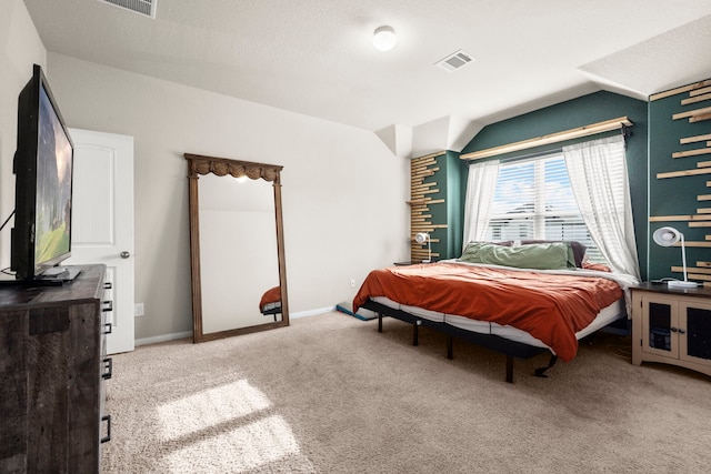 bedroom featuring light carpet