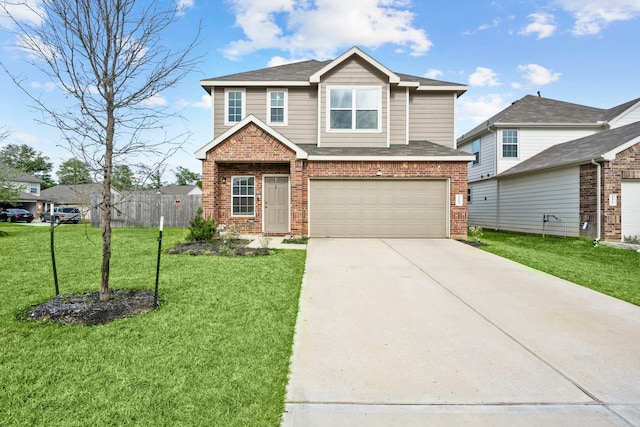 view of front of property featuring a front lawn and a garage