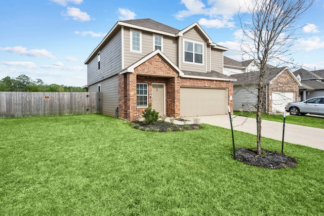 view of front of home featuring a front lawn and a garage