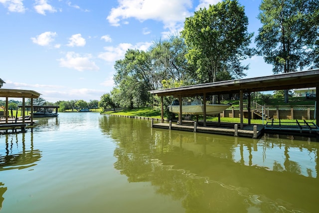 dock area featuring a water view