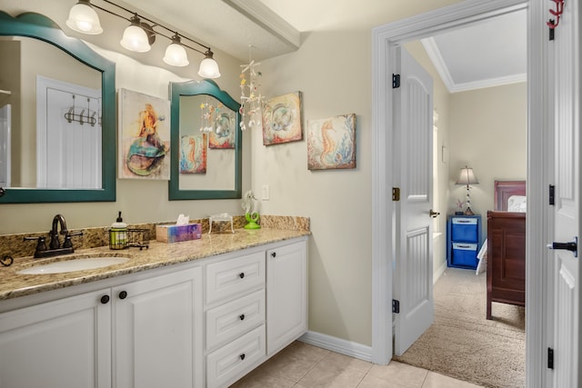 bathroom with tile flooring, ornamental molding, and vanity