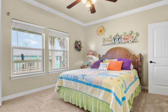 bedroom featuring ceiling fan, light colored carpet, and ornamental molding