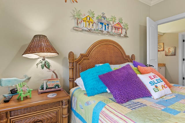 bedroom featuring ornamental molding