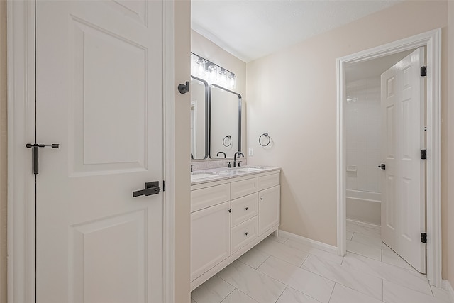 bathroom with vanity and tub / shower combination