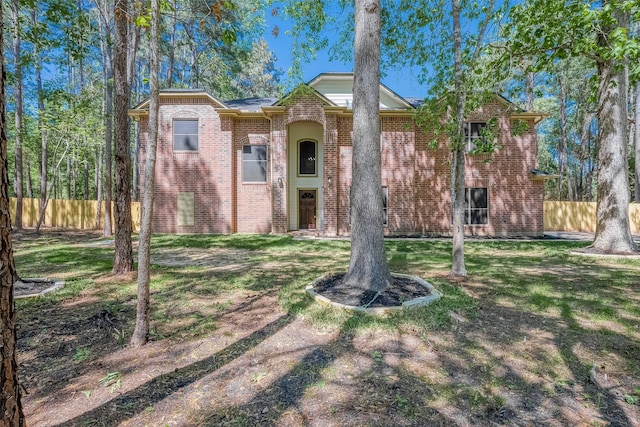 view of front facade with a front lawn