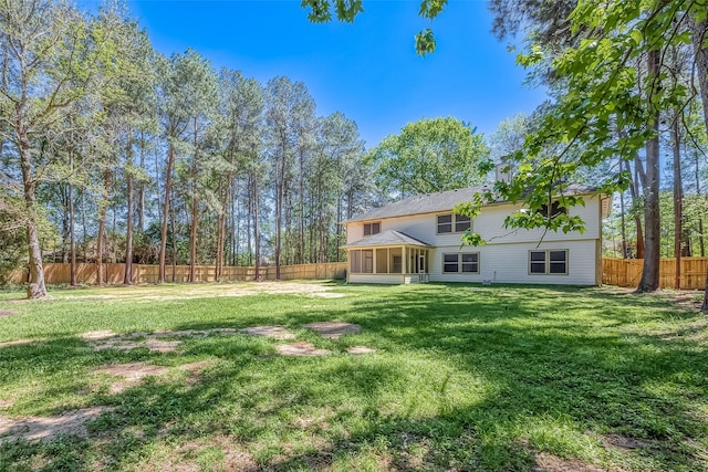 view of yard featuring a sunroom