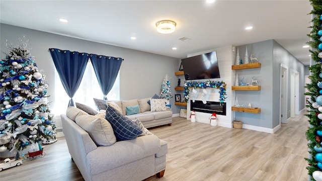 living room with light hardwood / wood-style floors