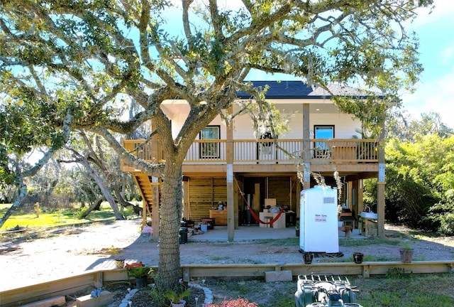 back of house with a patio