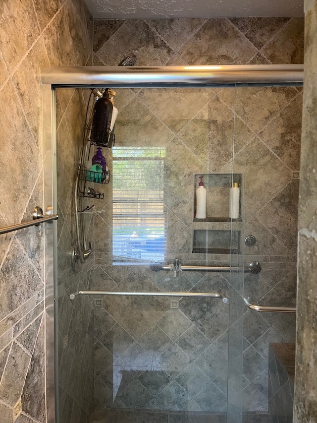 bathroom with walk in shower