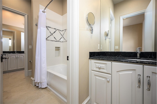 bathroom featuring vanity, tile patterned floors, and shower / bathtub combination with curtain