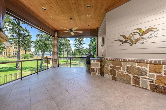 view of patio / terrace featuring ceiling fan