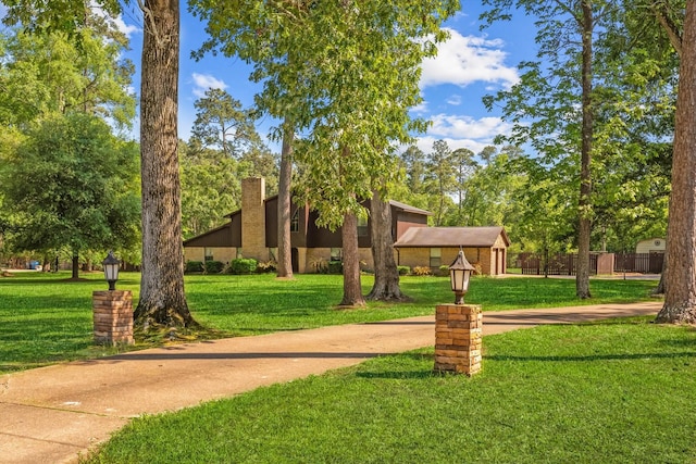 surrounding community featuring a lawn