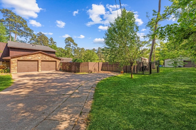 view of yard featuring a garage