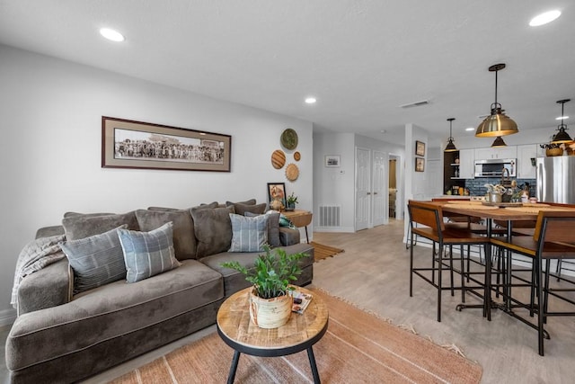 living room featuring light hardwood / wood-style floors