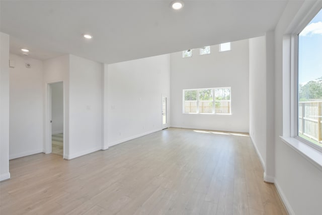 unfurnished room featuring light wood-type flooring