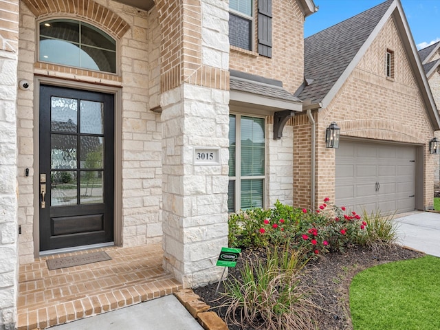 property entrance featuring a garage