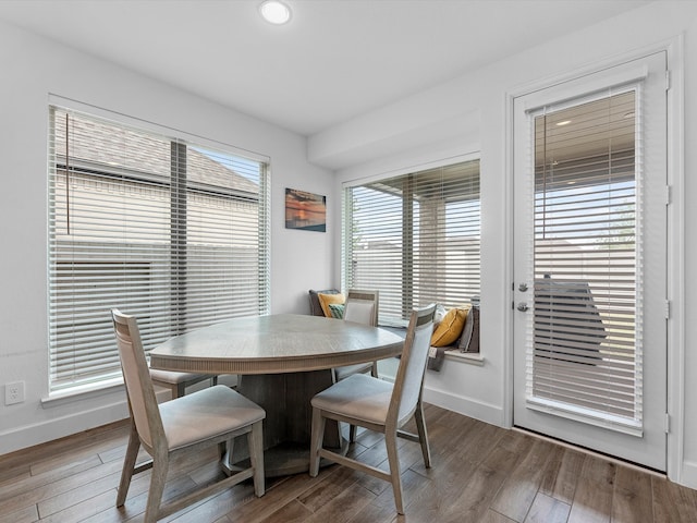 dining area featuring dark hardwood / wood-style flooring