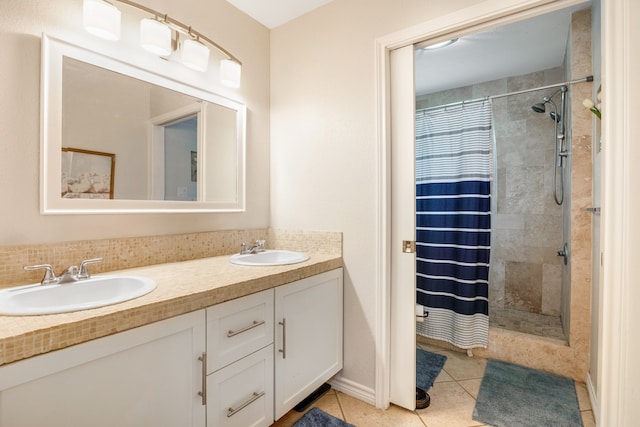 bathroom with walk in shower, tile flooring, and double vanity