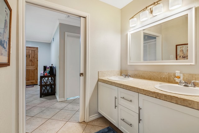 bathroom with double sink, tile flooring, large vanity, and ornamental molding