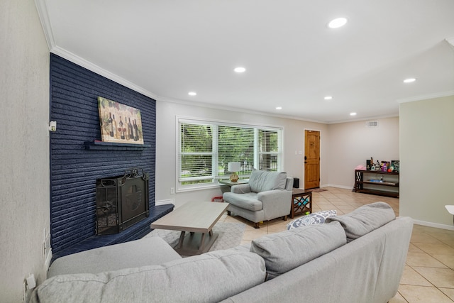 living room featuring light tile flooring, crown molding, a wood stove, and a fireplace