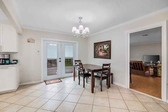 tiled dining area featuring an inviting chandelier, crown molding, and french doors